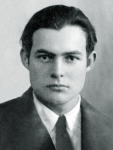 Ernest_Hemingway_1923_passport_photo-450x600